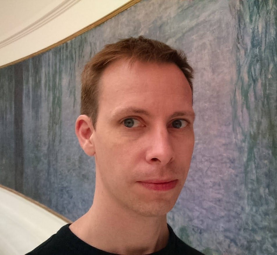 Trevor Lancaster with Monet's art in Paris